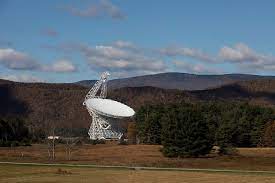 Radio telescope, disc shaped, aimed at sky